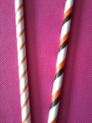 Plastic and paper straws with different stripe designs
