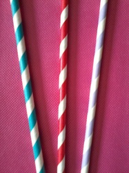 Plastic and paper straws with different stripe designs