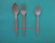 Biodegradable spoon and fork, spork in brown color